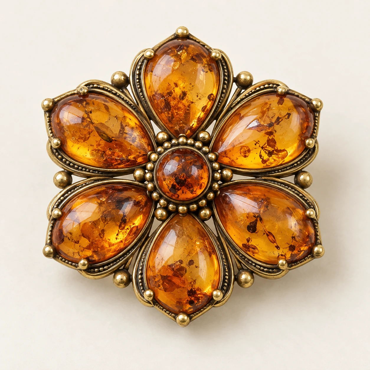 Amber Amber Conservatory Brooch, Amber-colored glass stones; antique gold plated brass